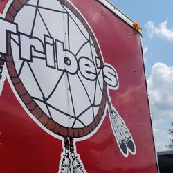 Tribe's - Owner said logo and name is based on his family. Each feather represents a member of his family. The small feather is his new Granddaughter.