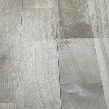 J. Wilson construction - Mop markings show that two coats were not applied - sloppy - General Contractors Near Me