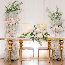 Luv Decor Rentals - Renter the serpentine table and chairs