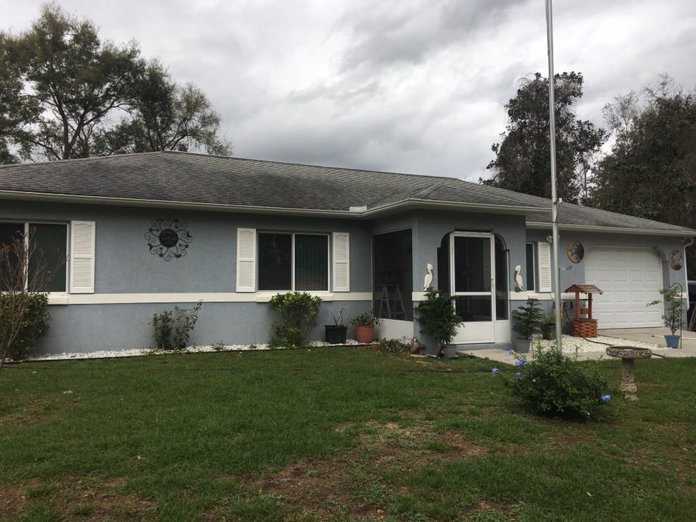 Slide of Gallagher Roof Cleaning