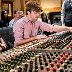 Dark Horse Institute - A student learning audio engineering on our Trident Series 60 Console