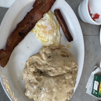 Carol's Corner Cafe - Biscuits and gravy, bacon, fried egg, are the sausage before remembering to take a picture lol - American Near Me - Vancouver, Washington Carol's Corner Cafe - Biscuits and gravy, bacon, fried egg, are the sausage before remembering to take a picture lol - American Near Me - Vancouver, Washington