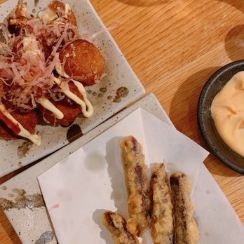Futago Udon - takoyaki top, half eaten purple sweet potato tempura on bottom - Japanese Near Me - Boston, Massachusetts Futago Udon - takoyaki top, half eaten purple sweet potato tempura on bottom - Japanese Near Me - Boston, Massachusetts