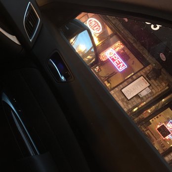 Patio - a view of a restaurant through a car window - Fast Food Near Me - Chicago, Illinois Patio - a view of a restaurant through a car window - Fast Food Near Me - Chicago, Illinois