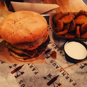 Farmhaus Burger - Customize your own burger: gluten free bun, onion ring, Gouda, pork confit and bacon jam. Fried pickles on the side. - Burgers Near Me - Augusta, Georgia Farmhaus Burger - Customize your own burger: gluten free bun, onion ring, Gouda, pork confit and bacon jam. Fried pickles on the side. - Burgers Near Me - Augusta, Georgia