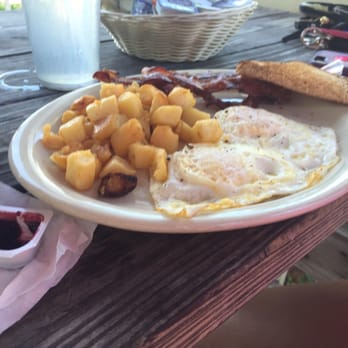 SeaCow Eatery - Eggs over medium and bacon with hash browns. - American Near Me - Edisto Beach, South Carolina SeaCow Eatery - Eggs over medium and bacon with hash browns. - American Near Me - Edisto Beach, South Carolina