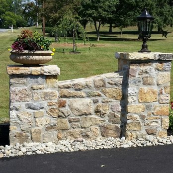 RL Landscaping and Design - a stone wall with a planter - Landscaping Near Me - Macungie, Pennsylvania RL Landscaping and Design - a stone wall with a planter - Landscaping Near Me - Macungie, Pennsylvania