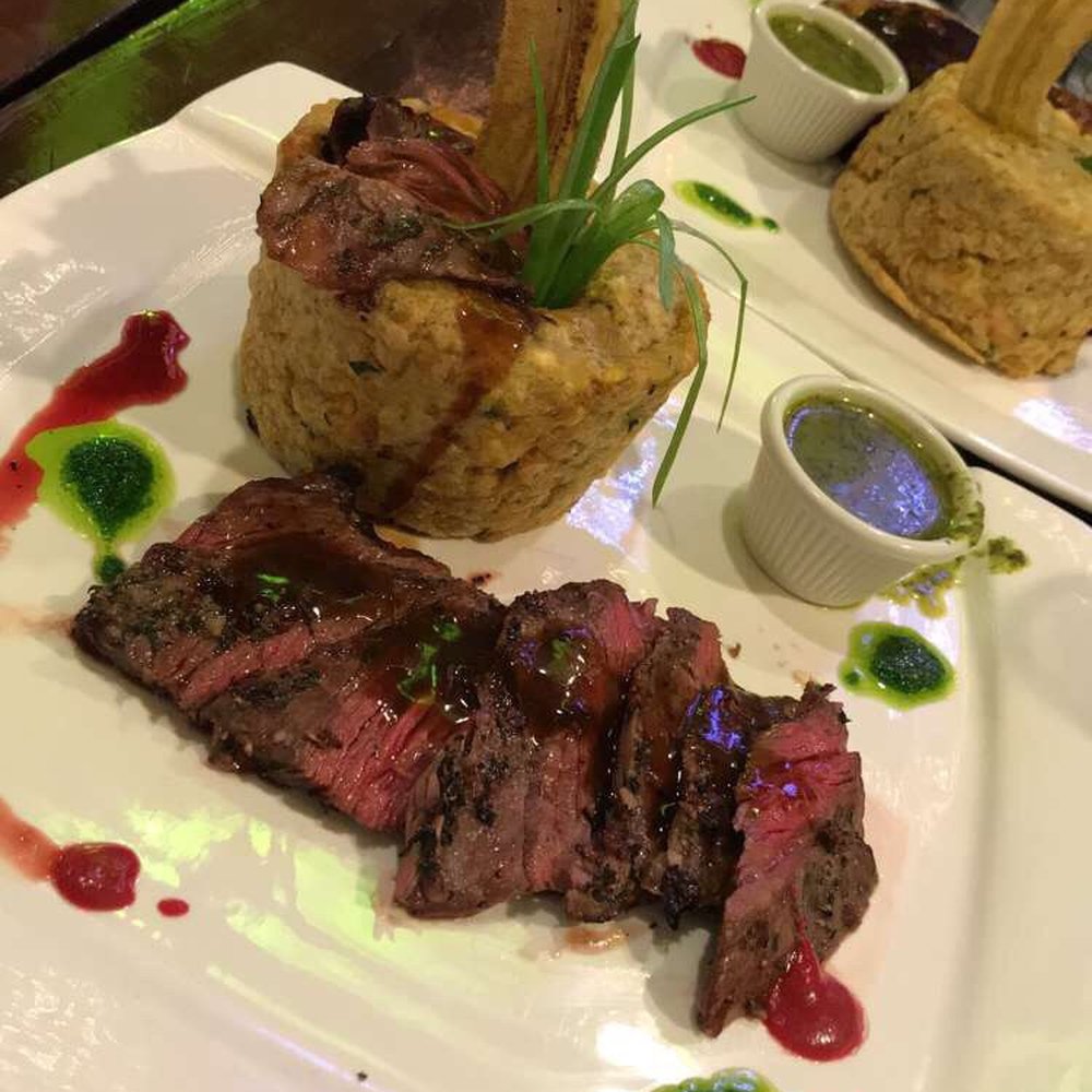 Bonfire Restaurant And Lounge - Churasco steak cooked rare included mofongo - Caribbean Near Me - Paterson, New Jersey