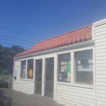 Sol De Mexico - a white building with a red roof - Mexican Near Me - Reedsport, Oregon Sol De Mexico - a white building with a red roof - Mexican Near Me - Reedsport, Oregon