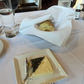 Bistro 90 - The Bread service with butter. Half of the butter was topped with amazing Hawaiian black salt - Steakhouses Near Me - Longs, South Carolina Bistro 90 - The Bread service with butter. Half of the butter was topped with amazing Hawaiian black salt - Steakhouses Near Me - Longs, South Carolina