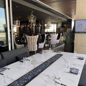 Wolf by Vanderpump at Caesars Republic Scottsdale - Patio table - Cocktail Bars Near Me - Scottsdale, Arizona Wolf by Vanderpump at Caesars Republic Scottsdale - Patio table - Cocktail Bars Near Me - Scottsdale, Arizona