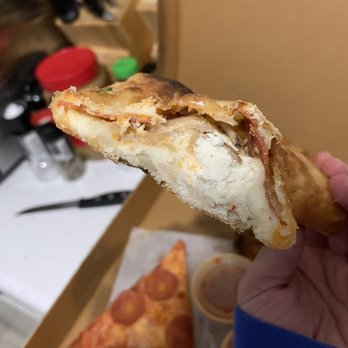 KT's Pizza - Stromboli (suppose to be pepperoni and sausage.. I added ricotta)! - Pizza Near Me - Jacksonville, Florida KT's Pizza - Stromboli (suppose to be pepperoni and sausage.. I added ricotta)! - Pizza Near Me - Jacksonville, Florida