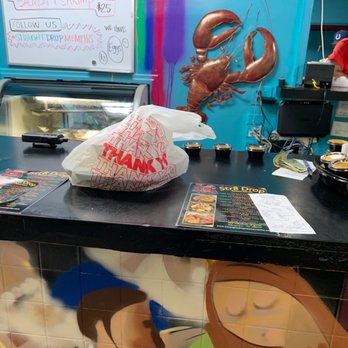 Straight Drop Seafood Memphis - The front counter of the place. - Seafood Near Me - Memphis, Tennessee Straight Drop Seafood Memphis - The front counter of the place. - Seafood Near Me - Memphis, Tennessee