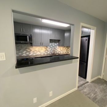 CaliBuilder - New pass though cut out with granite service top - General Contractors Near Me - San Mateo, California