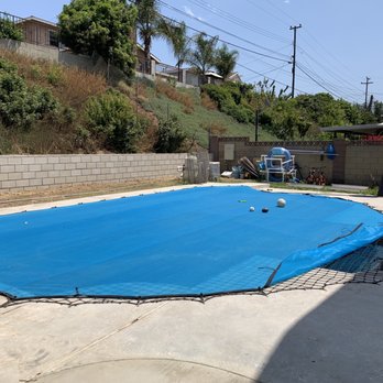 All-Safe Pool Fence & Covers - Long Beach - Blue leaf cover and brown netting. - Fences & Gates Near Me All-Safe Pool Fence & Covers - Long Beach - Blue leaf cover and brown netting. - Fences & Gates Near Me