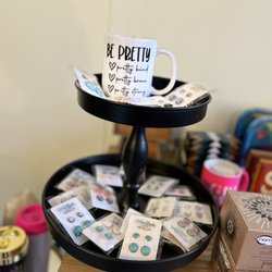 Kloies Korner - Fun mugs and display full of all new styles of earrings only at KLOIES KORNER