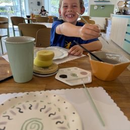 Seven-year old enjoying creating some art! Seven-year old enjoying creating some art!