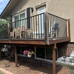 Castro Building And Repair - And here was the final result after we took out old wood railing and installed fortress railing,it even made his deck more solid.