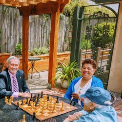 Carmel Foundation - Our welcoming outdoor spaces host member activities when the weather is agreeable, like our weekly chess group.