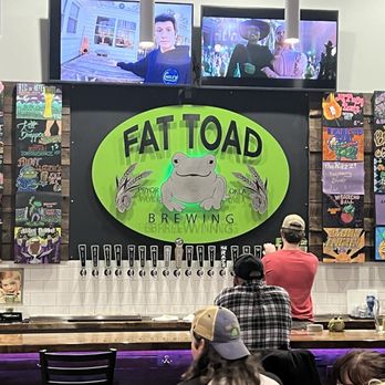 Fat Toad Brewing - Many taps, interesting artwork, describing the beer offerings. - Breweries Near Me - Pryor, Oklahoma