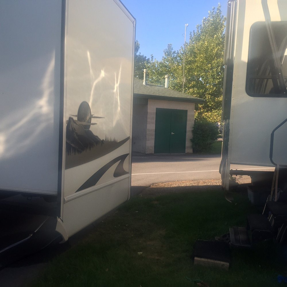 Springville / Provo KOA - This is a picture of 2 RVs side by side which shows how close they are. - RV Parks Near Me - Springville, Utah Springville / Provo KOA - This is a picture of 2 RVs side by side which shows how close they are. - RV Parks Near Me - Springville, Utah
