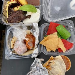 Tipico Salvadoreno with steak, Pupusas Revueltas (with slaw & salsa), Salvadorian Breakfast Burrito (comes with chips & salsa)