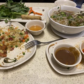 Pho Saigon 8 - Egg rolls, fried rice, ribeye pho, shrimp spring rolls not shown. - Vietnamese Near Me - Las Vegas, Nevada
