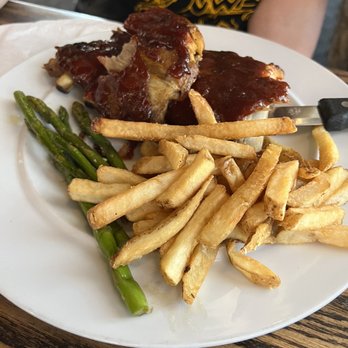 Schu's Grill & Bar - 1/2 Rack of Ribs, asparagus and fries - American Near Me - St. Joseph, Michigan Schu's Grill & Bar - 1/2 Rack of Ribs, asparagus and fries - American Near Me - St. Joseph, Michigan