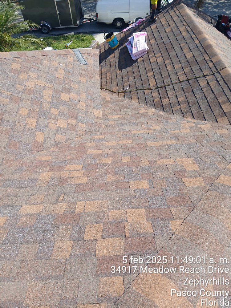 Slide of JAT Roofing