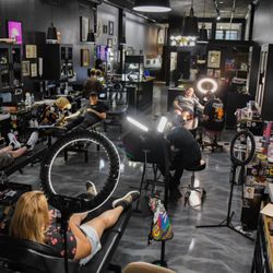 Evil Genius Tattoo Club - tattooing area inside Evil Genius Tattoo Club