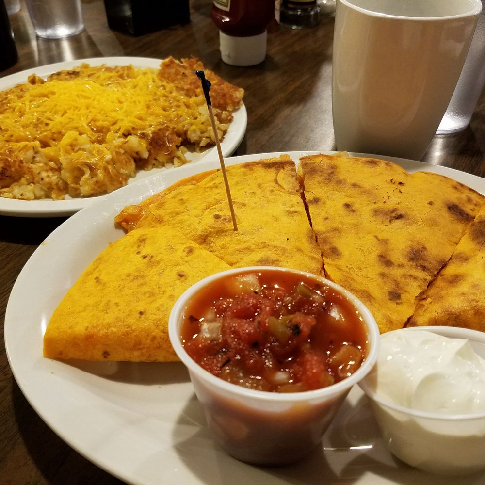 Wolfgang's Restaurant - Quesadilla with a side (full) of hash browns with cheese on top - Breakfast & Brunch Near Me - Grand Rapids, Michigan Wolfgang's Restaurant - Quesadilla with a side (full) of hash browns with cheese on top - Breakfast & Brunch Near Me - Grand Rapids, Michigan