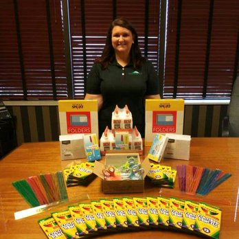 Ogle Law - Ogle Law, LLC, gathering school supplies to donate to the 'Community Partnership for Children'. - Personal Injury Law Near Me - Daytona Beach, Florida