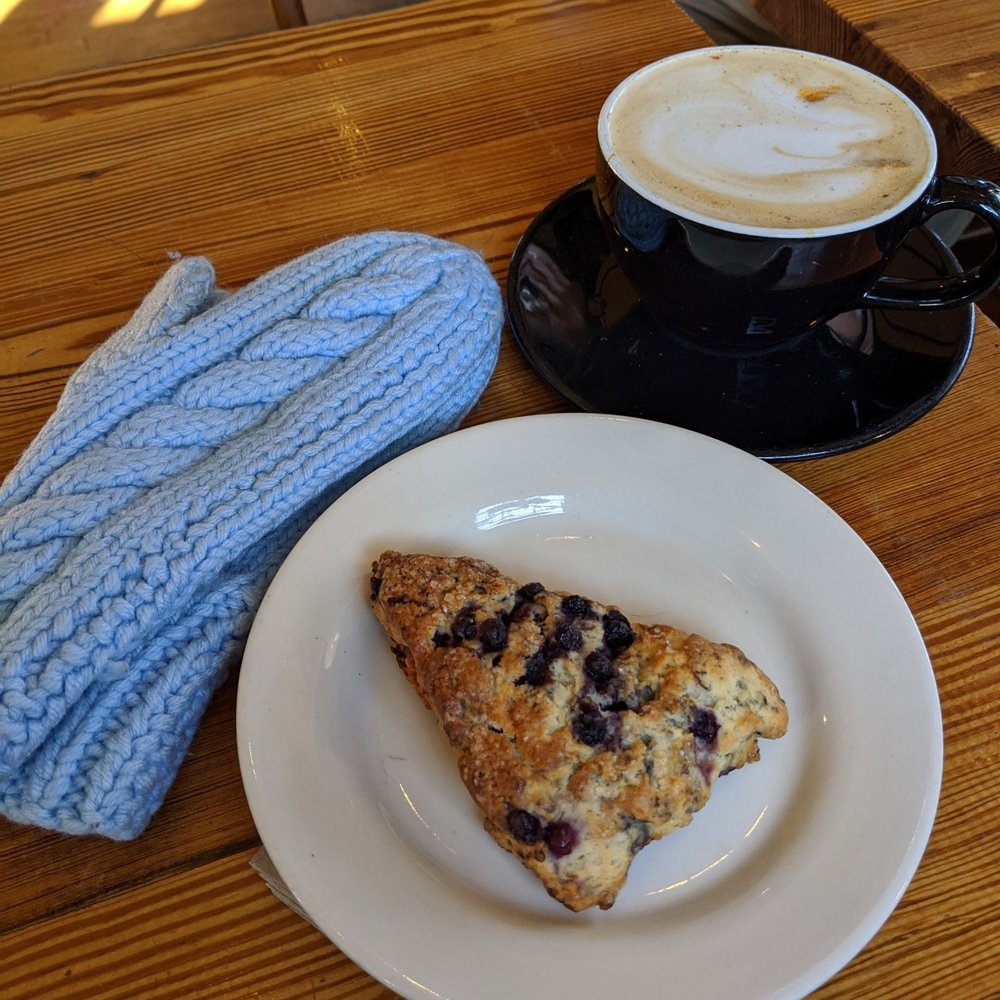 Izzy's Coffee Den - The Cardigan latte - Coffee & Tea Near Me - Asheville, North Carolina Izzy's Coffee Den - The Cardigan latte - Coffee & Tea Near Me - Asheville, North Carolina