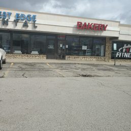 a car parked in front of the store