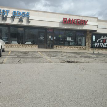 Peterson's Tasty Delight Bakery - a car parked in front of the store - Bakeries Near Me - Hoffman Estates, Illinois