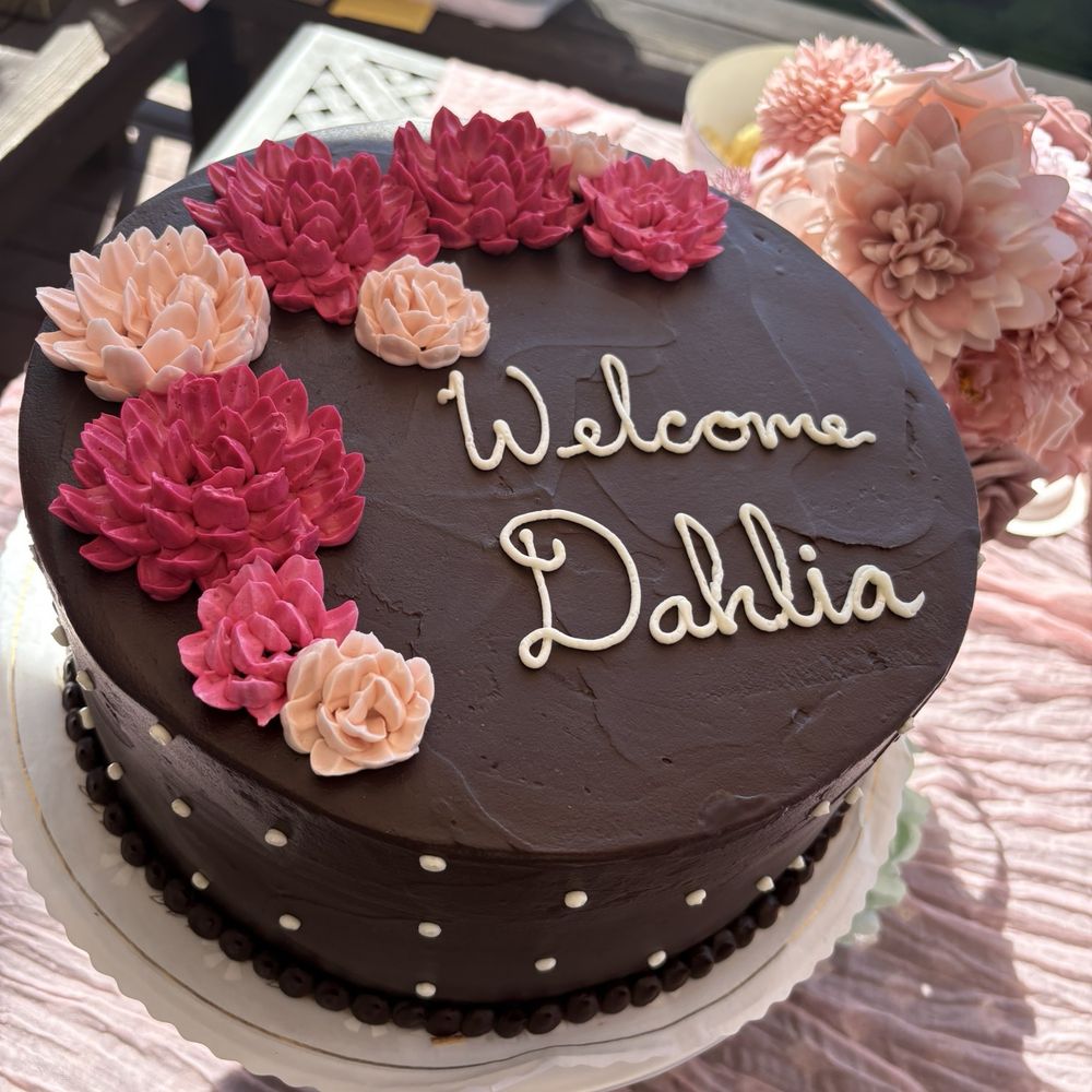 Some Crust Bakery - Chocolate cake with chocolate ganache frosting and filled with chocolate ganache and raspberry. Decorated for a baby shower. - Bakeries Near Me - Claremont, California Some Crust Bakery - Chocolate cake with chocolate ganache frosting and filled with chocolate ganache and raspberry. Decorated for a baby shower. - Bakeries Near Me - Claremont, California
