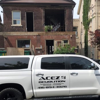 Acez Demolition - a truck parked in front of a house - Excavation Services Near Me - Toronto, Ontario Acez Demolition - a truck parked in front of a house - Excavation Services Near Me - Toronto, Ontario