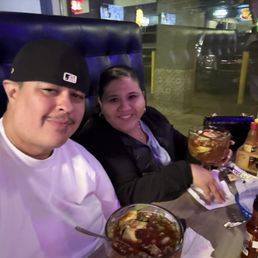 Me and the lady enjoying our lovely night and the food. Me and the lady enjoying our lovely night and the food.