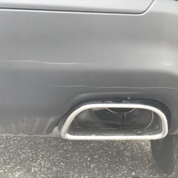 Atlantic Chrysler Jeep Dodge - Original bumper on the brand new Jeep...before we even touched the car!! - Car Dealers Near Me - West Islip, New York