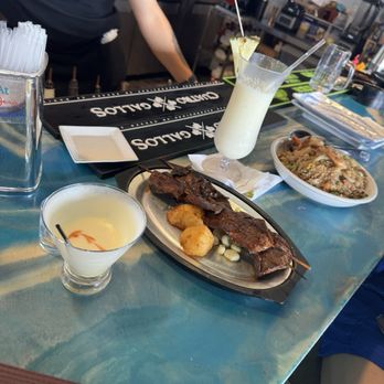 At Peru - Hard to find traditional Peruano food... passion fruit pisco sour and pina colada... Anticucho (hard to find) and arroz Chaufa both A1 - Peruvian Near Me - Hollywood, Florida