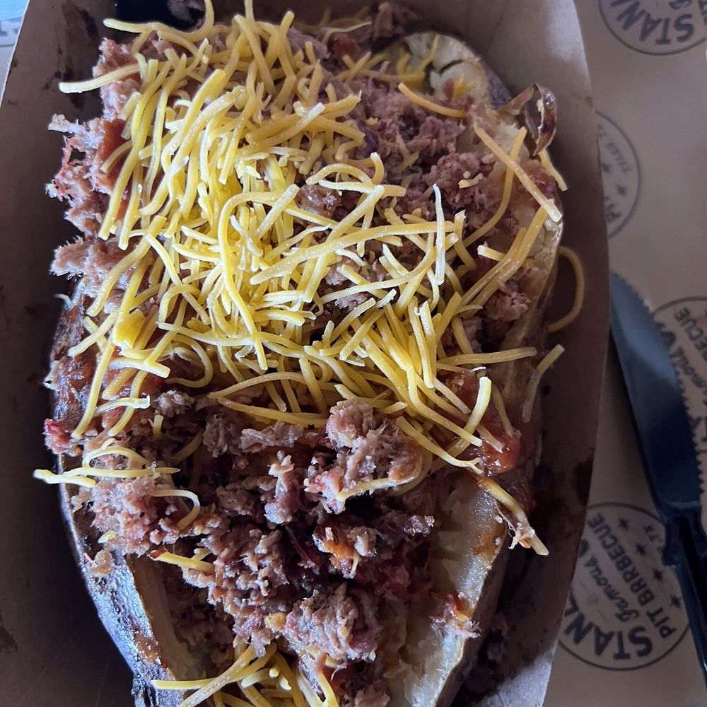 Stanley's Famous Pit Barbecue - Chopped brisket Giant Smoked Stuffed Potato - Barbeque Near Me - Tyler, Texas Stanley's Famous Pit Barbecue - Chopped brisket Giant Smoked Stuffed Potato - Barbeque Near Me - Tyler, Texas