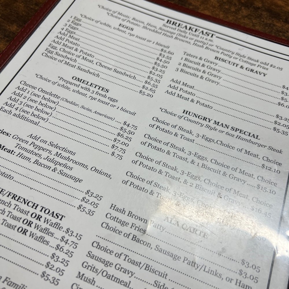 Covered Bridge Restaurant - a menu on a wooden table - American Near Me - Cayuga, Indiana Covered Bridge Restaurant - a menu on a wooden table - American Near Me - Cayuga, Indiana
