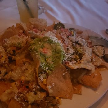 Roaring Fork - Happy hour nachos so good. Spicy for me but definitely recommend. - American Near Me - Scottsdale, Arizona