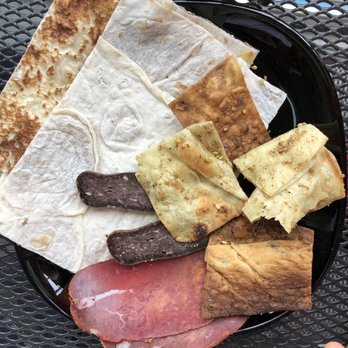 Lamajoun - Complimentary apps with cured beef, sausage, fresh lavash and crispy spiced lavash - Mediterranean Near Me - Richmond, British Columbia Lamajoun - Complimentary apps with cured beef, sausage, fresh lavash and crispy spiced lavash - Mediterranean Near Me - Richmond, British Columbia