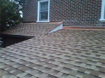 Slide of Goliath Roofing