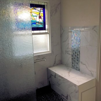 Texas Shower Company - We added a bench with a long drawer for storage - General Contractors Near Me