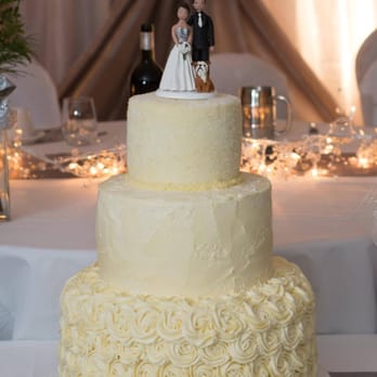 GOODIES - a wedding cake with a bride and groom figurine on top - Bakeries Near Me - Ottawa, Ontario GOODIES - a wedding cake with a bride and groom figurine on top - Bakeries Near Me - Ottawa, Ontario