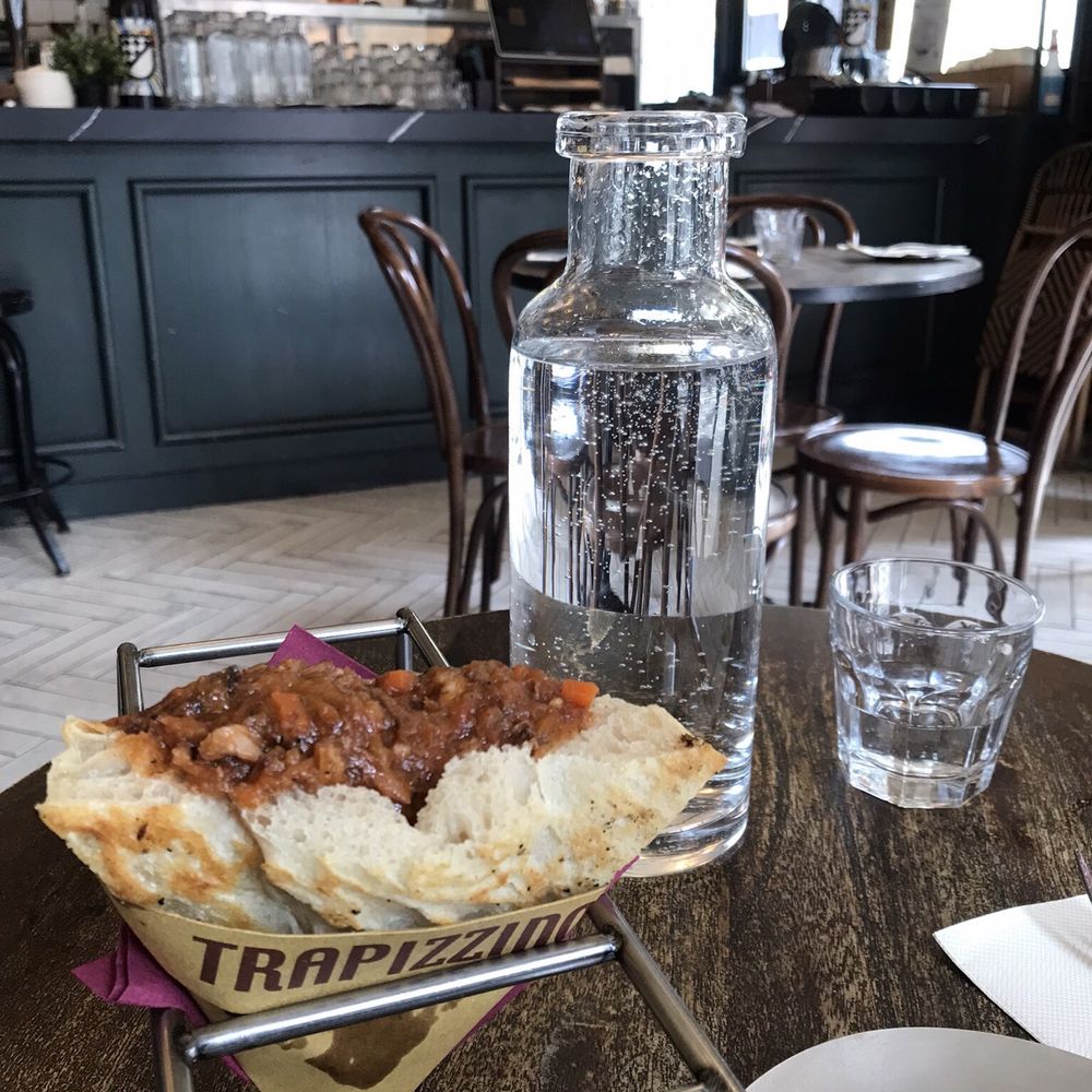 Trapizzino - Braised Coda alla Vaccinara (Oxtail) - Italian Near Me - New York, New York Trapizzino - Braised Coda alla Vaccinara (Oxtail) - Italian Near Me - New York, New York