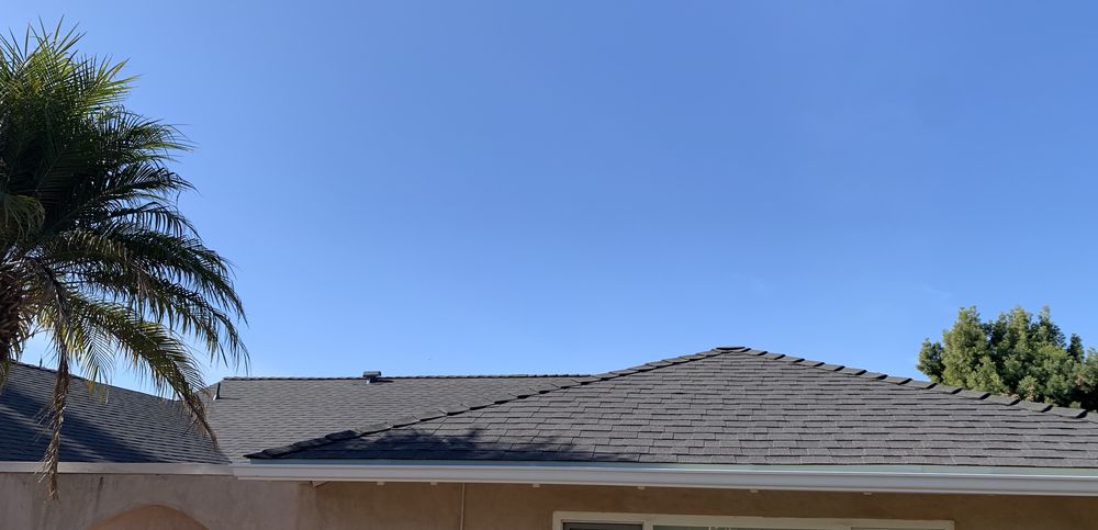 Slide of Dennis Cook Roofing