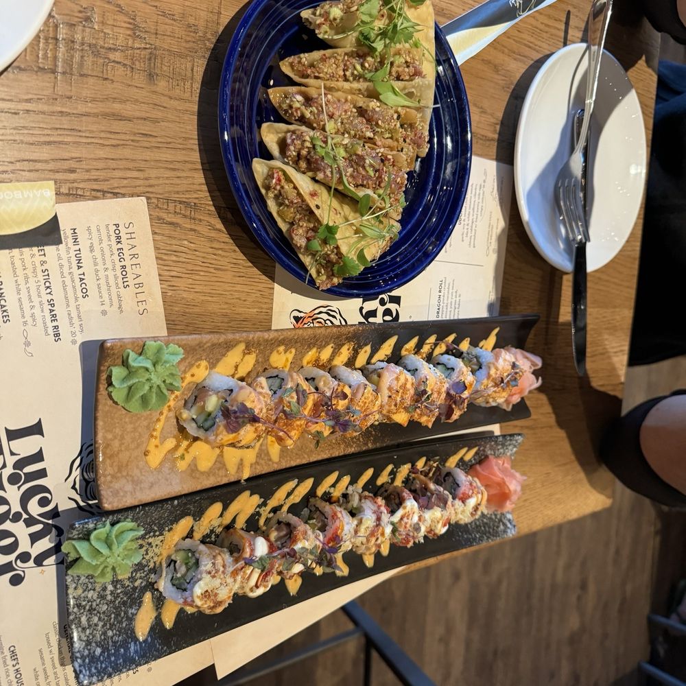 MINI TUNA TACOS, SALMON SUNRISE ROLL, SPICY TUNA ROLL MINI TUNA TACOS, SALMON SUNRISE ROLL, SPICY TUNA ROLL